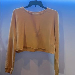 Yellow cropped long sleeve with paradise on sleeve